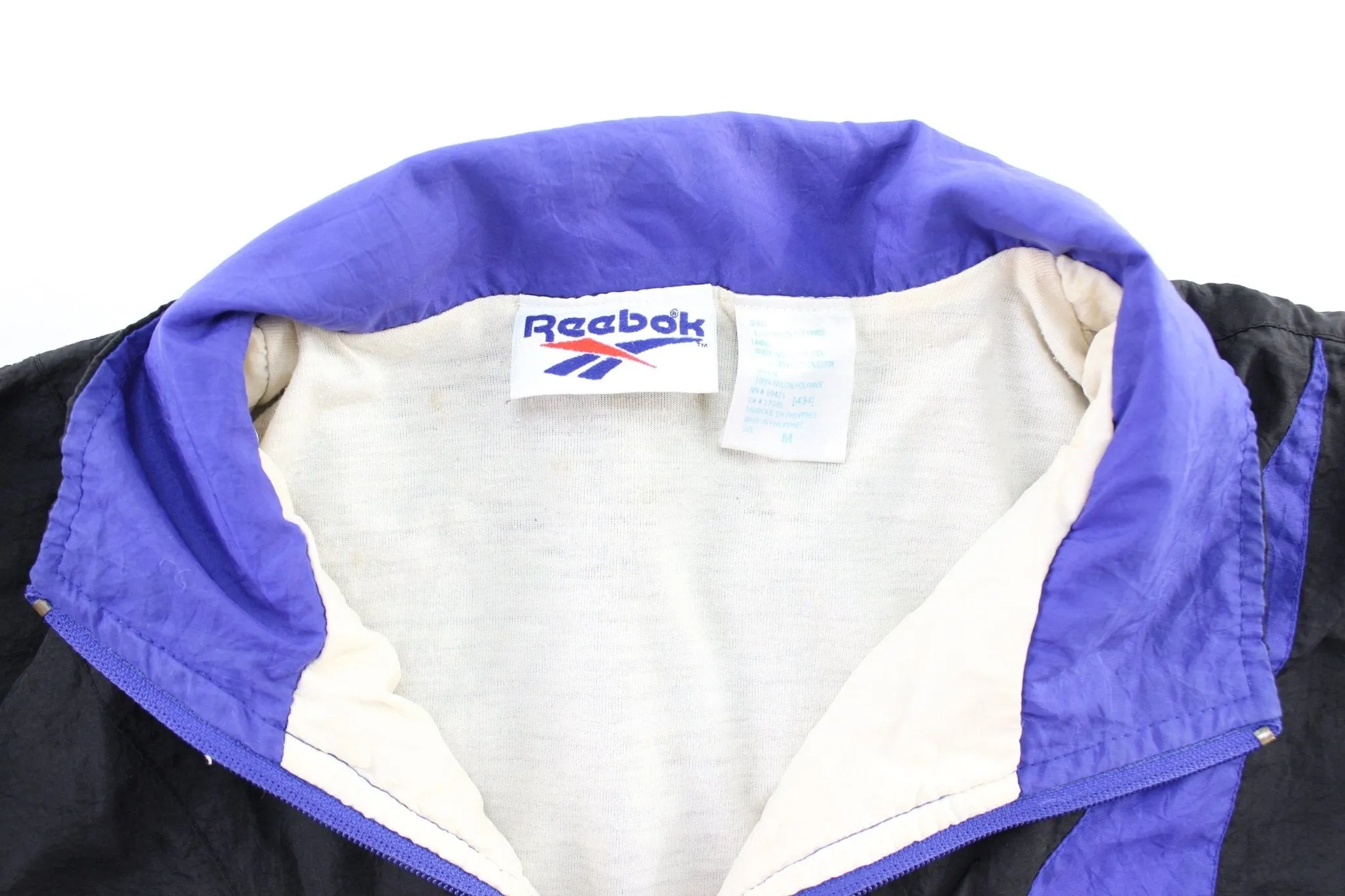 Women's 90's Reebok Embroidered Logo Black, Blue, & White Zip Up Jacket